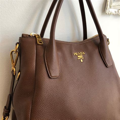 brown Prada purse